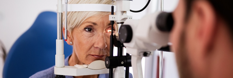 Ophthalmologist examining a patient.