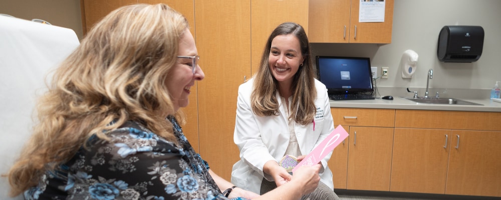 Dr. Norris with breast care patient