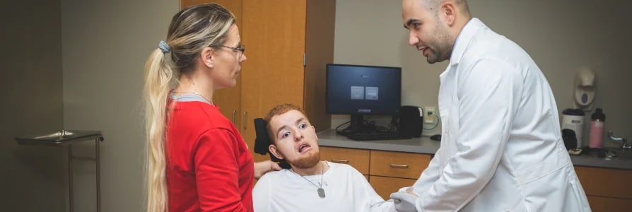 Physical Medicine and Rehabilitation provider with a patient.