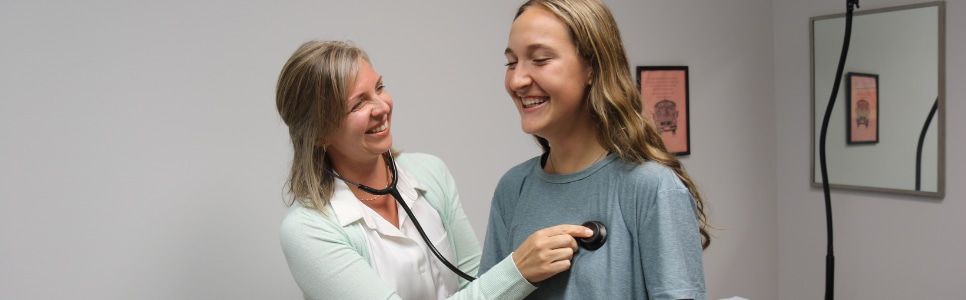 Dr. Dobbins with teen patient