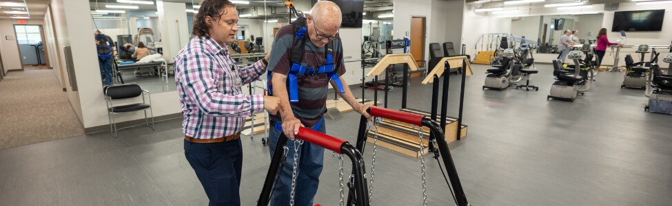 Tony Garcia, PT, DPT, with Parkinson's patient. 