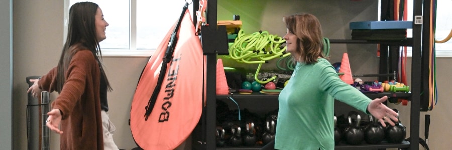 Physical therapist working with a patient.