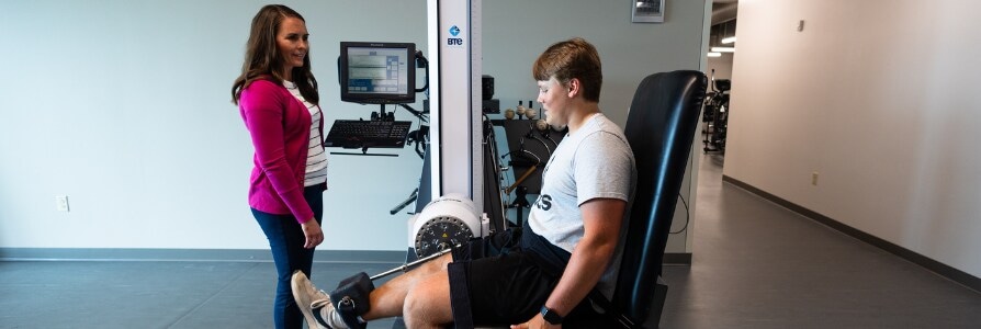 Physical therapist, Erin Baumert, working with a patient.
