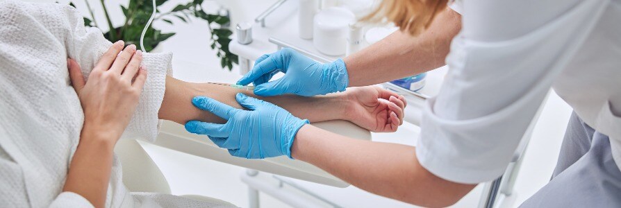 Patient receiving IV infusion