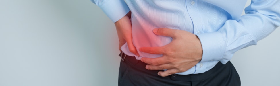 Man with side pain due to kidney stones