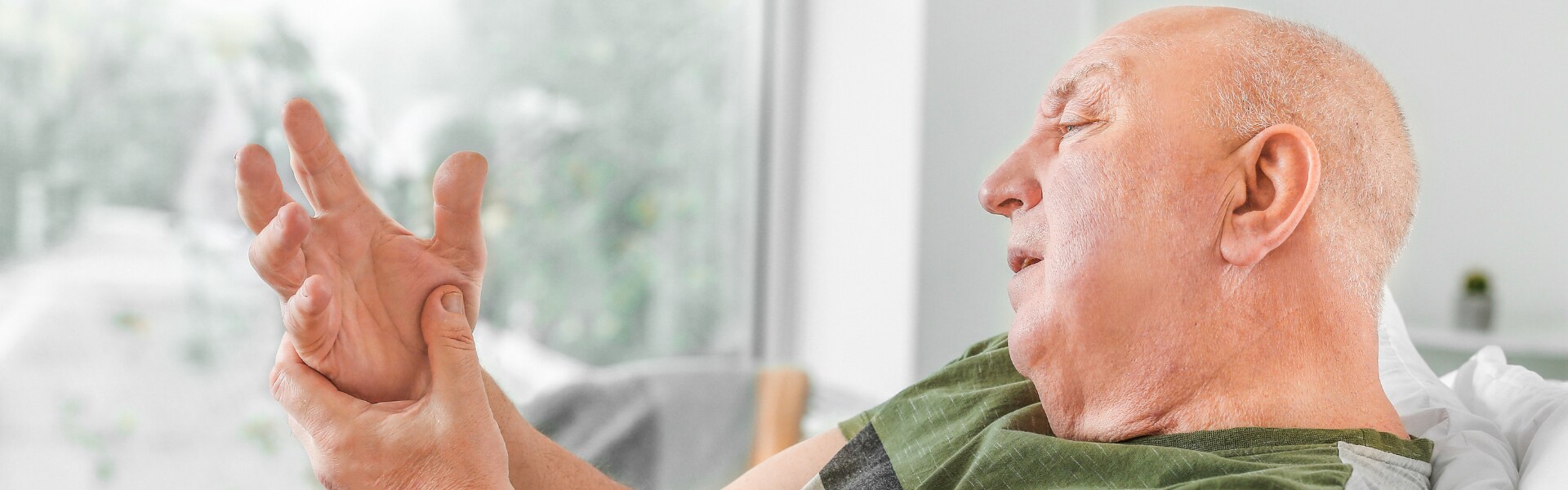 A person worried about his hand shaking slightly.