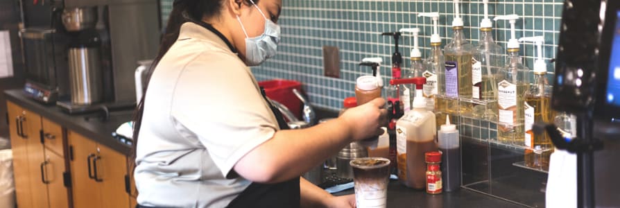 employee making coffee