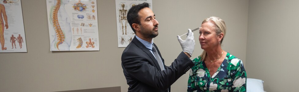 Dr. Balkaya with Migraine patient