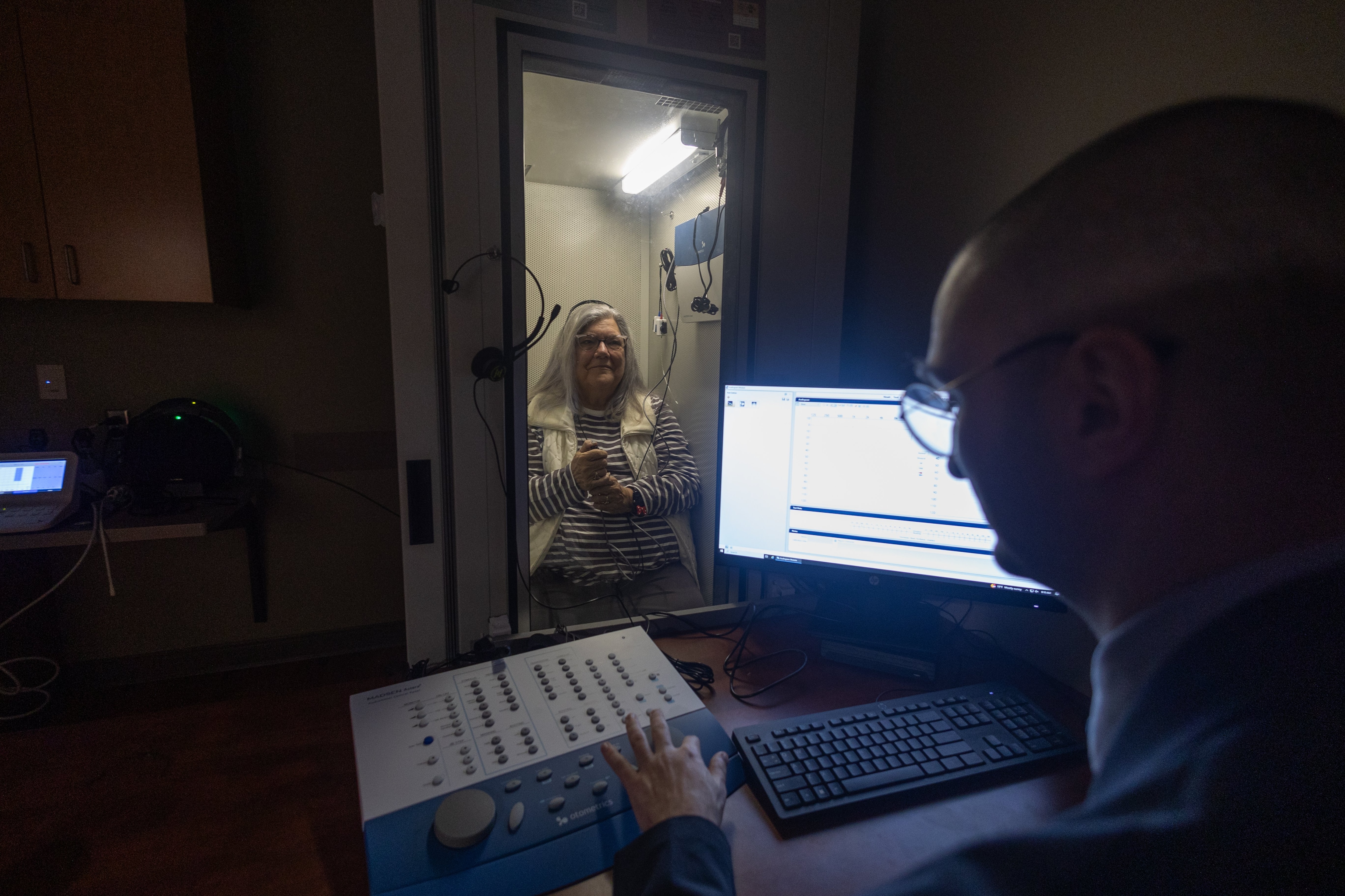 Woman getting her hearing tested